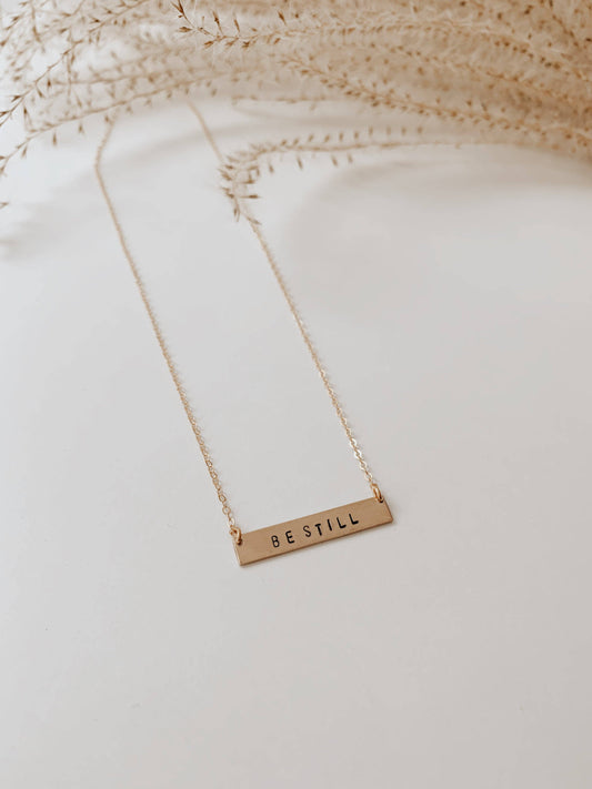 Océanne - 'Be Still' Stamped Bar Necklace: Gold-filled / Arial (default) / Horizontal