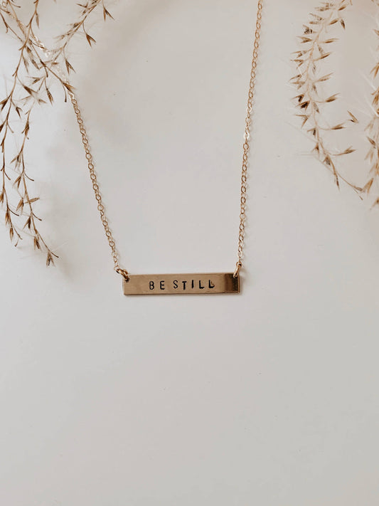 Océanne - 'Be Still' Stamped Bar Necklace: Gold-filled / Arial (default) / Horizontal