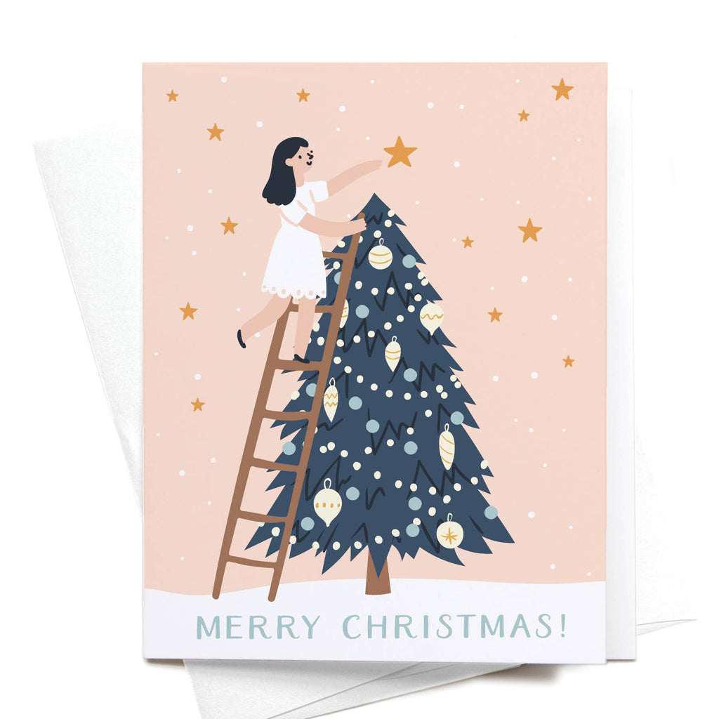 Merry Christmas! Girl Putting Star on Tree Greeting Card